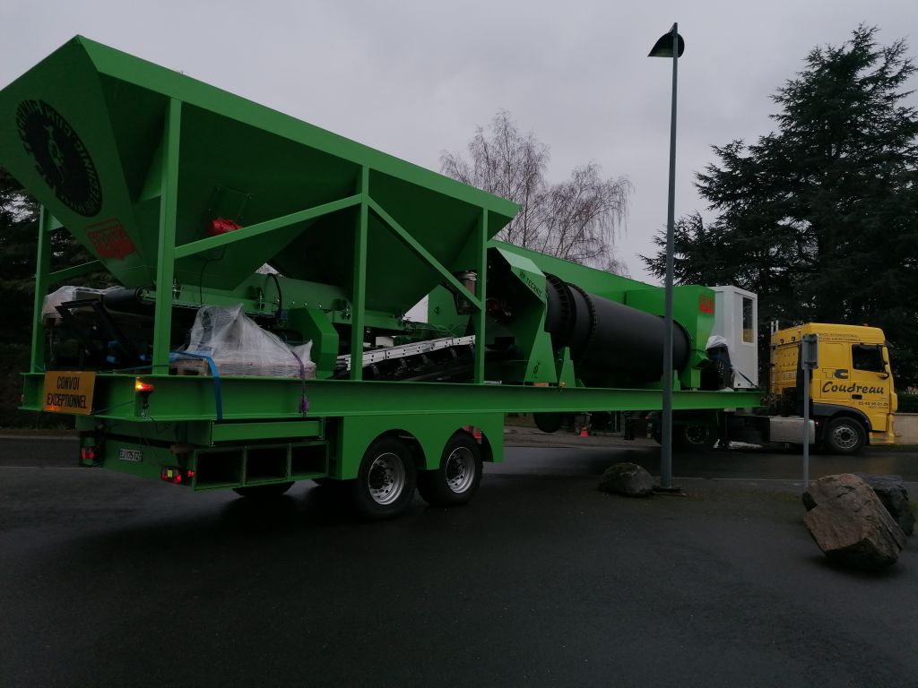 feeders and dryer drum on hot asphalt unit